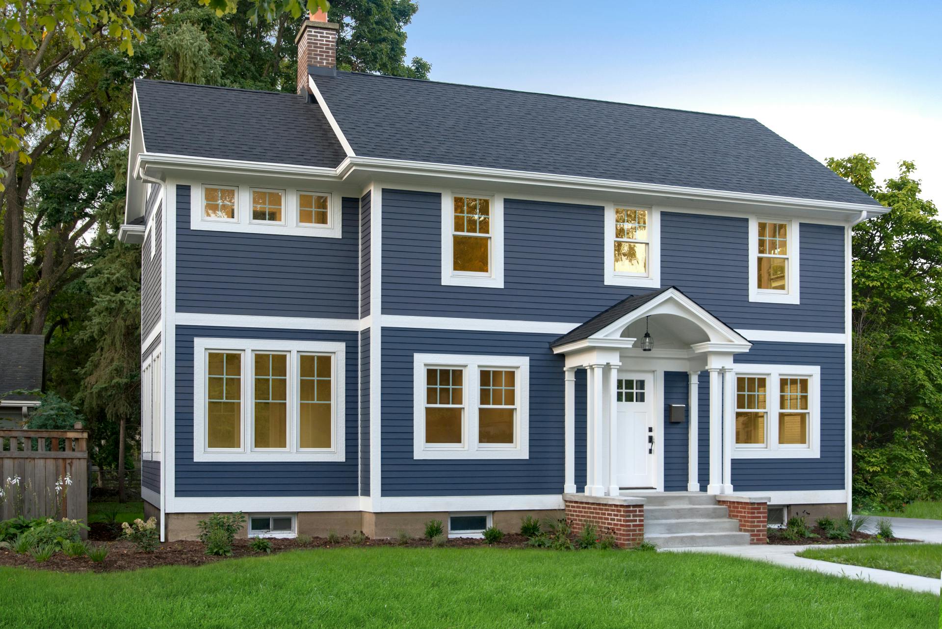 large blue suburban house with james hardie colors and styles