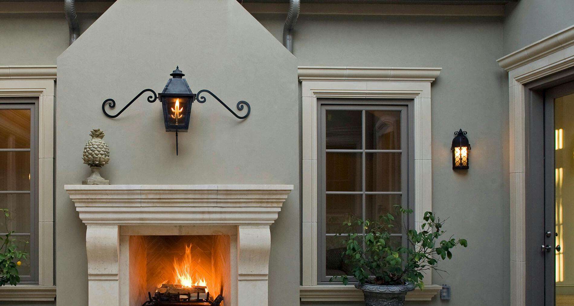 fireplace porch for a large suburban house with stucco wall