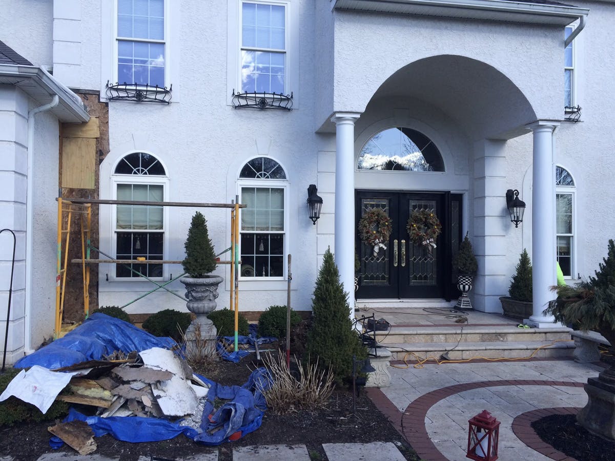 stucco remediation in white for house in ambler, pa