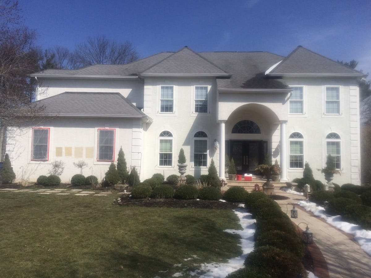 stucco remediation in white for house in ambler, pa