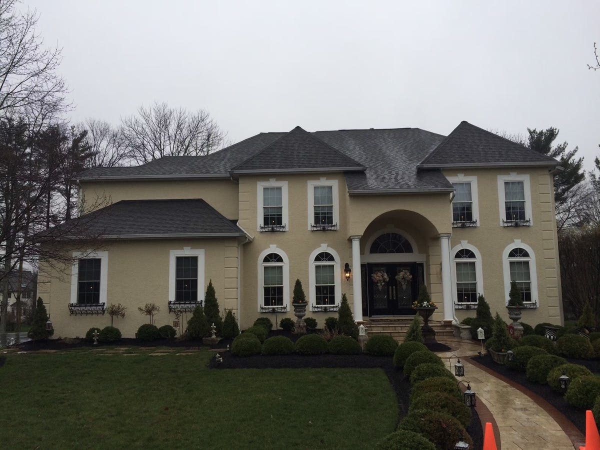 stucco remediation for suburban house in ambler, pa