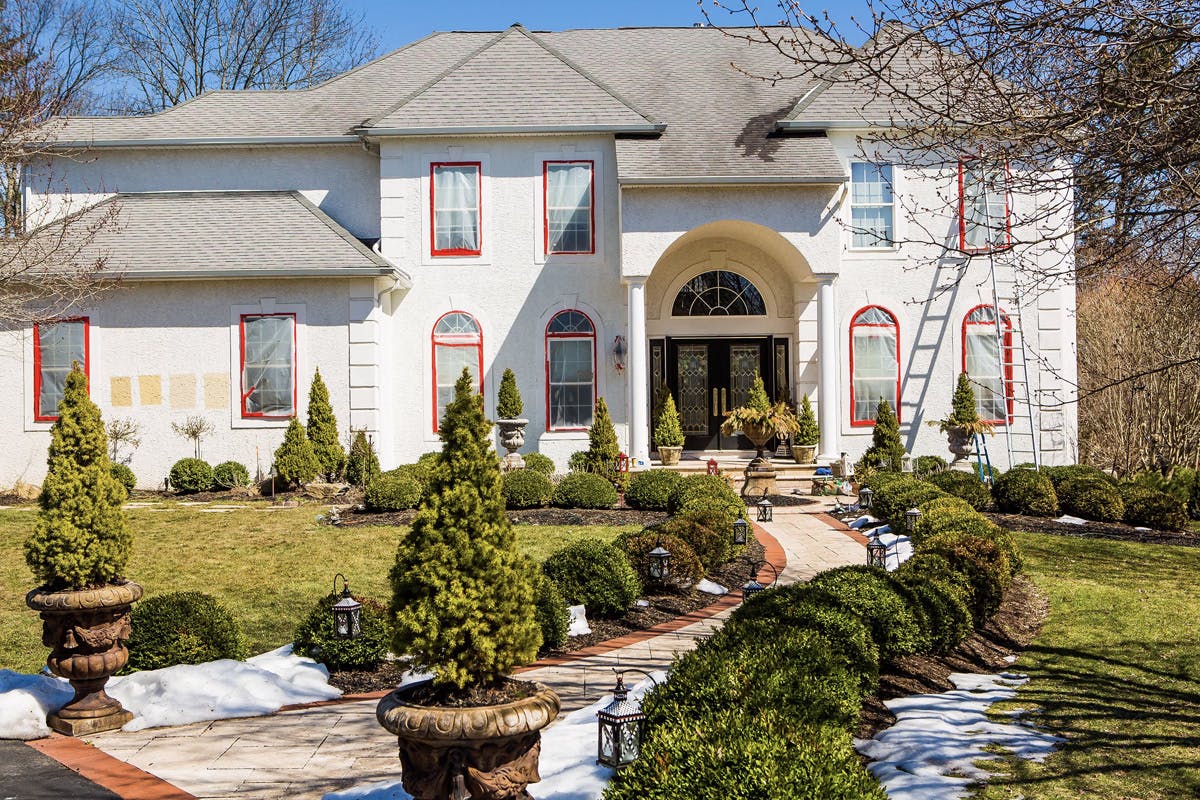 stucco remediation for large, two story suburban house in ambler, pa