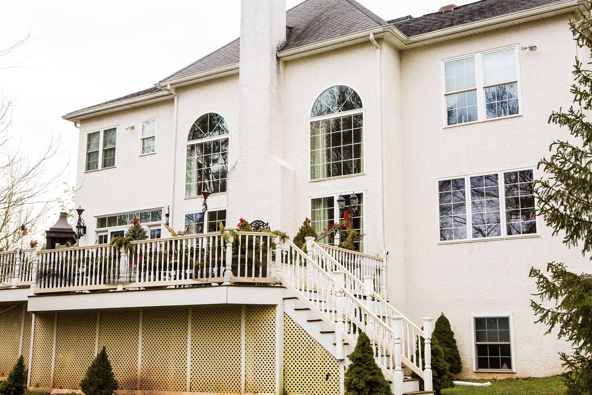 stucco remediation for large, two story suburban house in ambler, pa