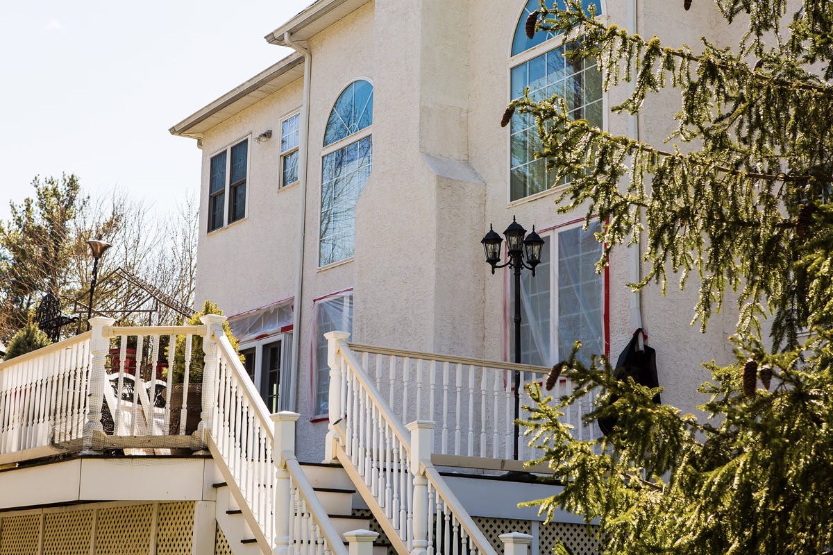 stucco remediation for large, two story suburban house in ambler, pa