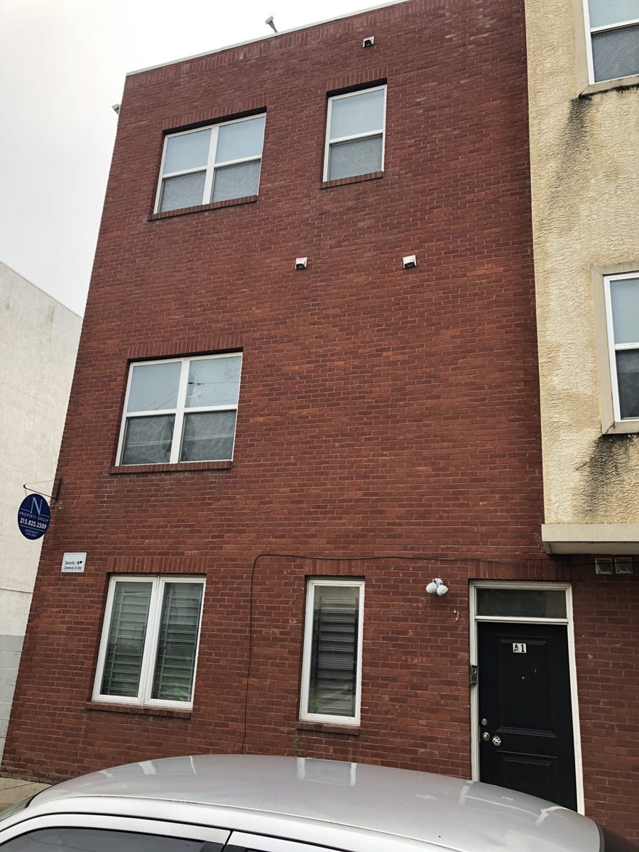 apartment complex with stucco remediation in progress