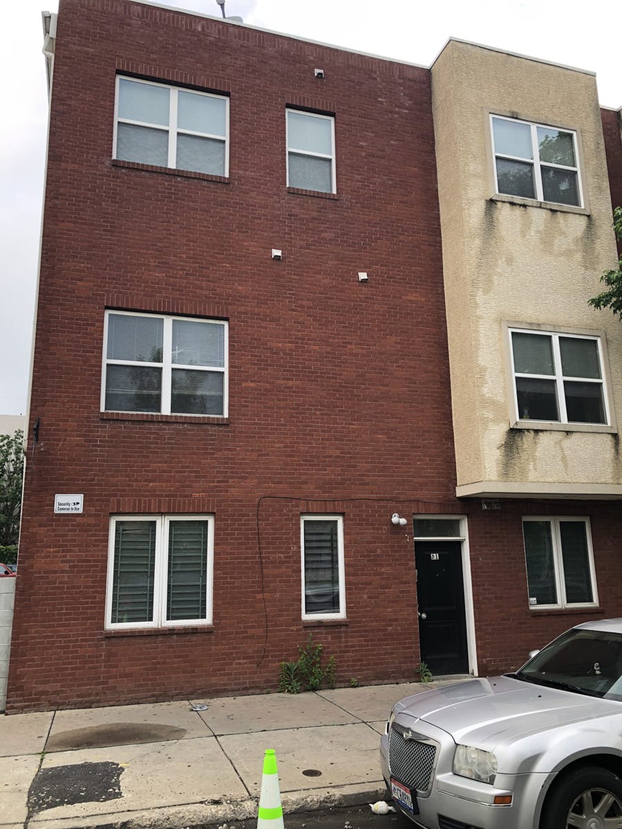 apartment complex with stucco remediation in progress