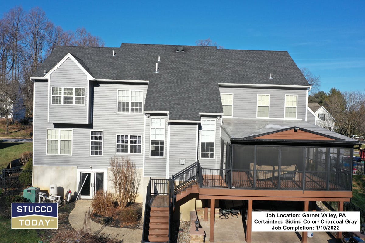 suburban house with stucco remediation completed