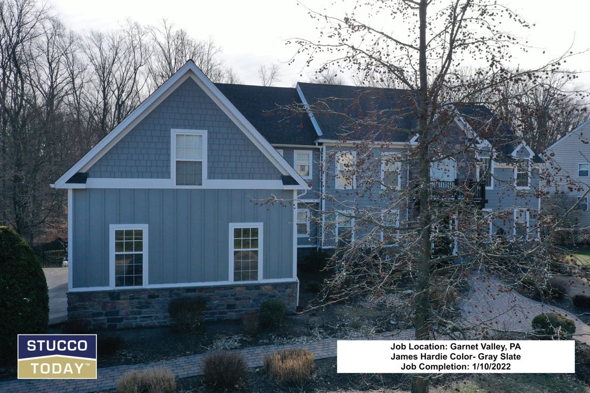 suburban house with stucco remediation completed