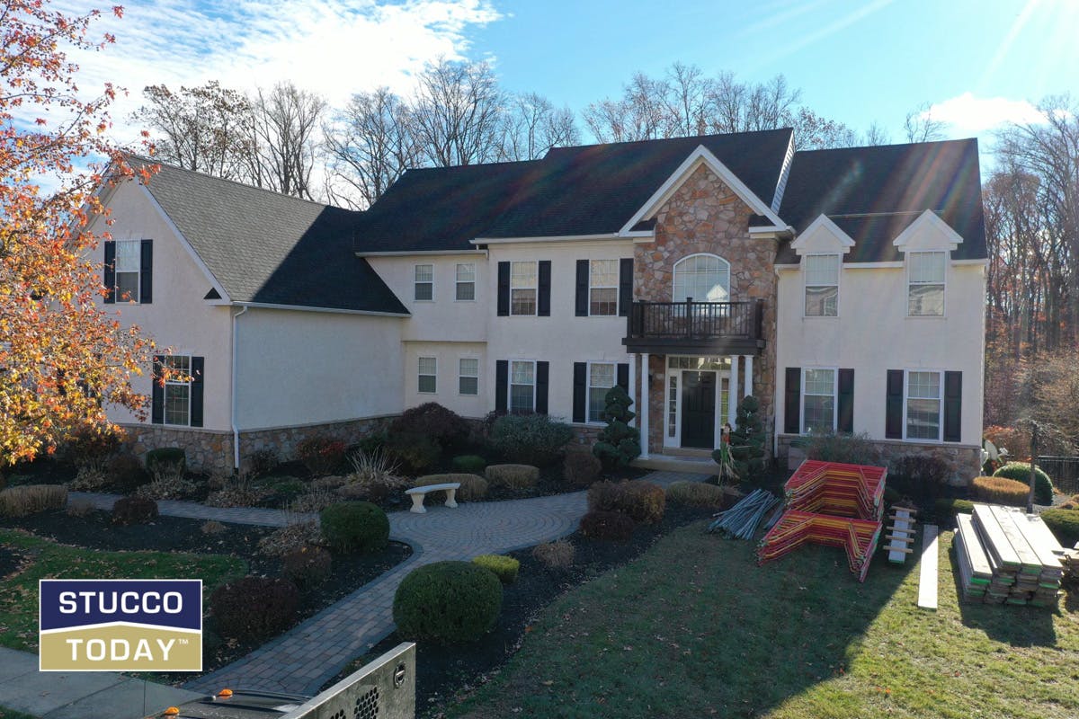 suburban house with stucco remediation completed