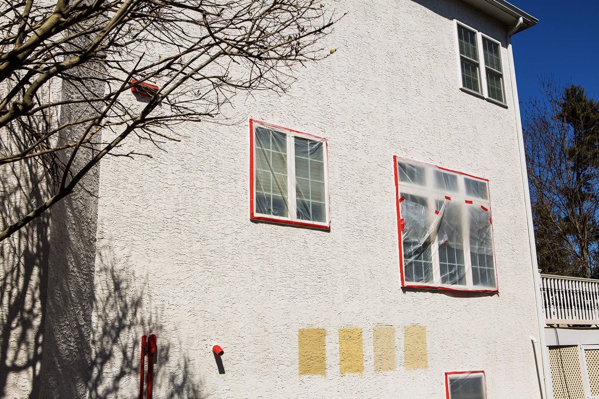 stucco remediation for large, two story suburban house in ambler, pa