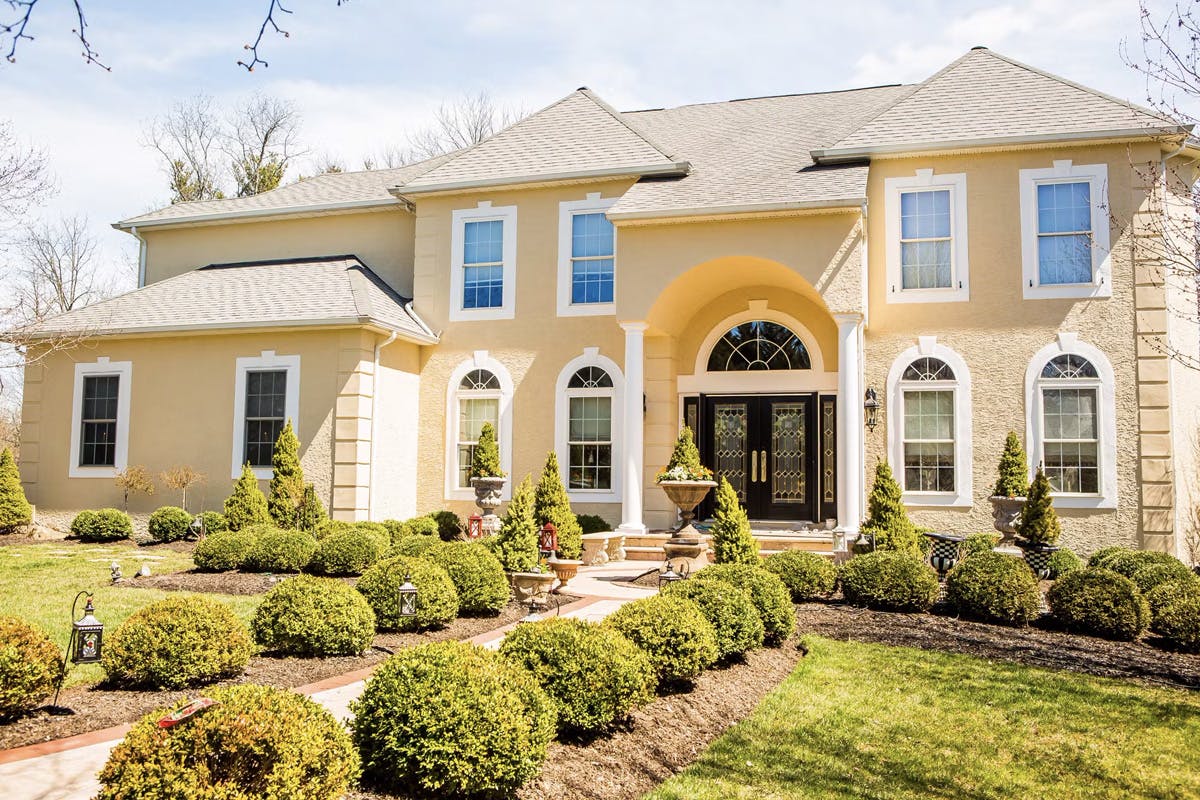 stucco remediation for large, two story suburban house in ambler, pa